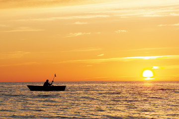 Sunset at the sea and boat