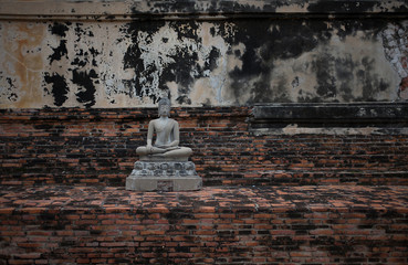 Buddha and the ancient ruins of Ayutthaya in Thailand.