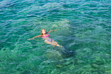Woman swimming in the sea