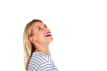 Fototapeta premium Attractive woman looking upwards