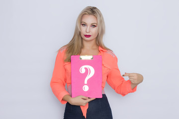 woman holding signboard with question mark