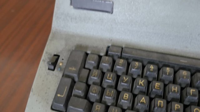  Closeup of vintage typewriter keyboard, flying camera
