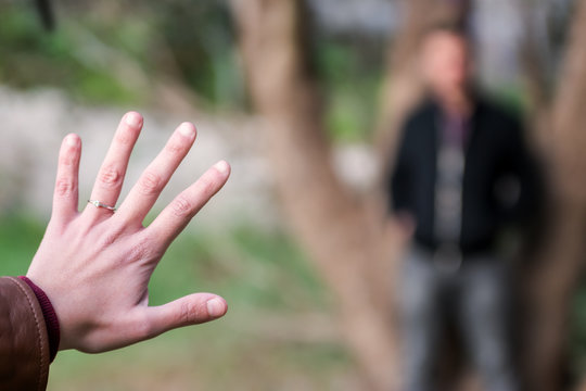 Engagment Photos, Rings Visible On The Hands In The Nature. Focused Rings. Blurred Background.