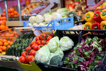 boxes filled with fresh fruit and vegetables for sale
