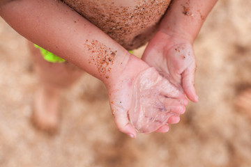 young girl found a jellyfish on the beach
