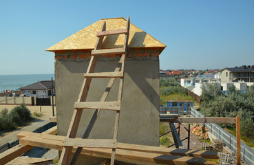 Installing roof on the chimney