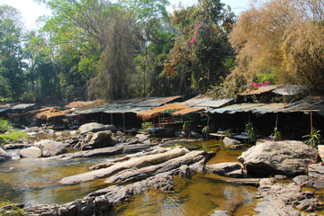 Riverside house in a slum of Thailand