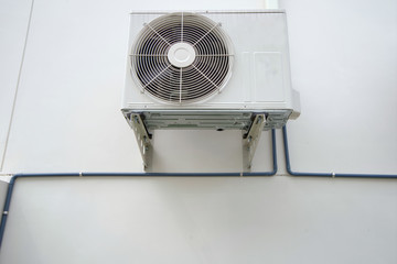 air conditioner outdoor unit or heat Pump Compressor or Condenser Fan for support Air Conditioner in home or house.