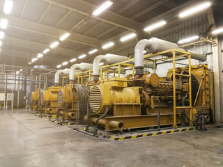 A very large electric diesel generator in factory for emergency,equipment plant modern technology...