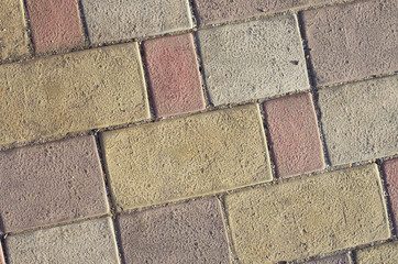 Fototapeta premium paving stone colorful pattern of bricks. Background