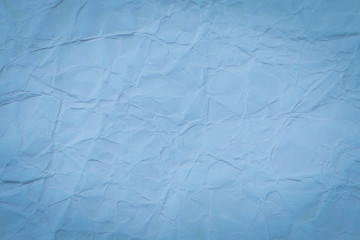 Blue crumpled paper
