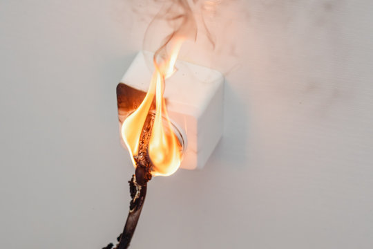 Electrical short circuit. Failure caused by burning wire and rosettes socket plug in house.