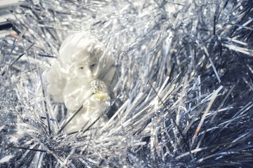 New Year's texture, background of silver bokeh from Christmas holiday tinsel for Christmas and greeting cards