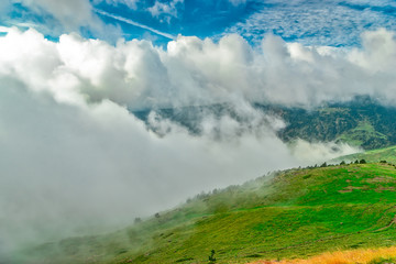 The fog advances over the meadows of the Pyrenees