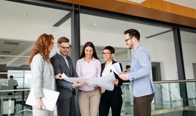 Creative business people working on business project in office