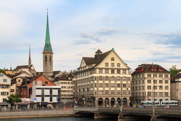 Beautiful cityscape of Zurich, Switzerland, with the Predigerkirche, seen from the shore of the river Limmat in summer
