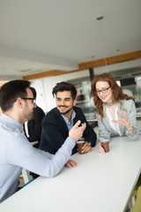 Business people having fun during break in an office