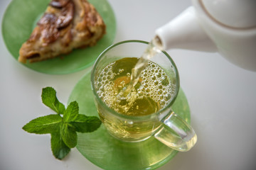 Green tea in the glass cup