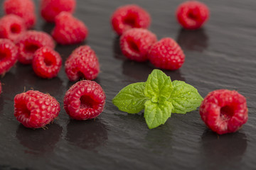 Raspberry berries on shale plate