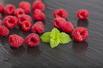 Raspberry berries on shale plate