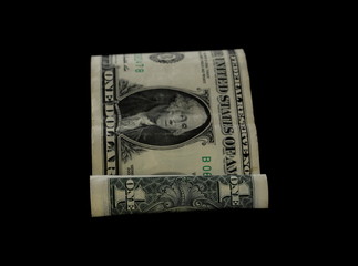 One dollar bill isolated on black background
