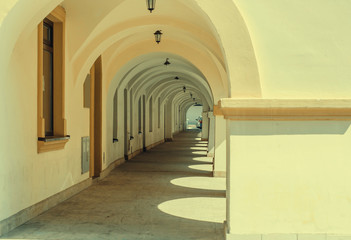 Passage between ancient houses, arches