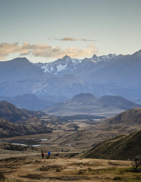 hikers at Chacabuco Valley with a view over the Jeinimeni Mountain peaks, Parque Patagonia, AysŽn Region, Chile.