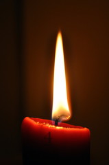 Christmas candle light in a dark room