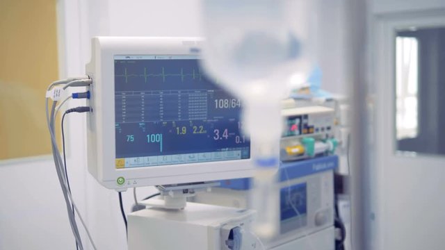 Readings of vital signs on a medical monitor are changing