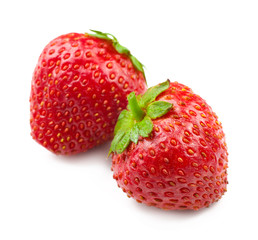 Ripe strawberries on white background