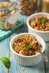Traditional, mexican baked sweet rice, with almonds, raisins and walnuts.
