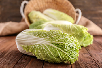 Fresh ripe cabbage on wooden table