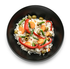 Bowl with tasty boiled rice and vegetables on white background