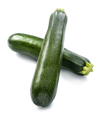 Fresh zucchinis on white background