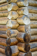 Vintage wood texture, logs, wall of a wooden house
