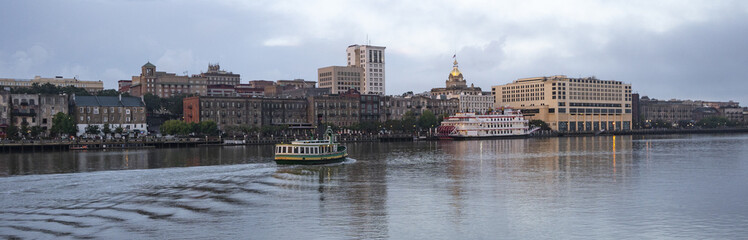 An Empty Ferry Boat Moves on Schedule Crossing the River in Savannah Georgia