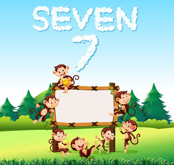 Obraz na płótnie Canvas Seven monkey at the wooden board