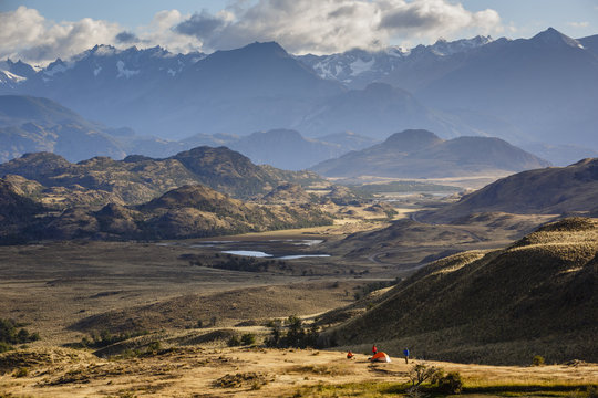 hikers and camp at Chacabuco Valley with a view over the Jeinimeni Mountain peaks, Parque Patagonia, AysŽn Region, Chile.