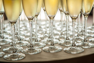 Glasses with cold champagne at the event