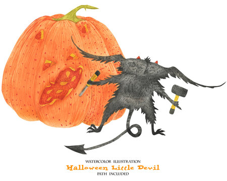 6530046 Little devil carves pumpkin for halloween