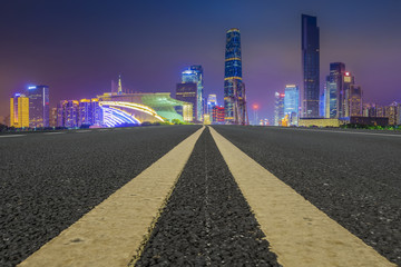 Fototapeta na wymiar Road pavement and Guangzhou city buildings skyline