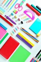 Composition with different school stationery on white background