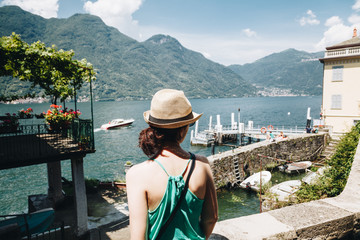 girl looking the lake Como Lake from Nesso, Lombardy, Italy