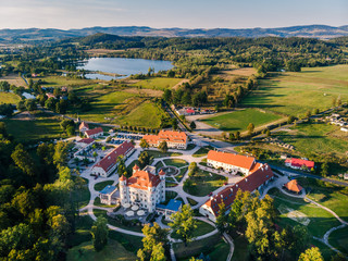 A beautiful view from the drone at Wojanow Palace and the garden. In the background, the Karkonosze...