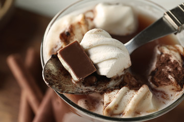 Cup of delicious cocoa with marshmallows, closeup