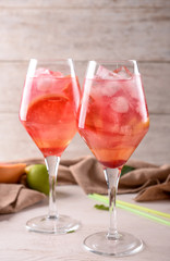 Fresh summer cocktail in glasses on light table