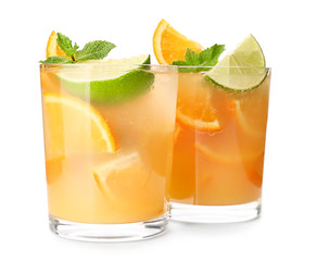 Fresh summer cocktail in glasses on white background