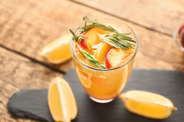Fresh summer cocktail in glass on slate plate