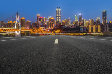 Naklejka premium Road pavement and Chongqing urban architecture skyline