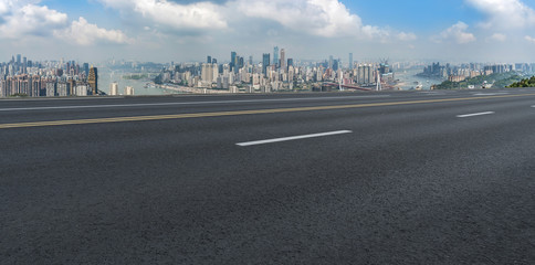 Road pavement and Chongqing urban architecture skyline